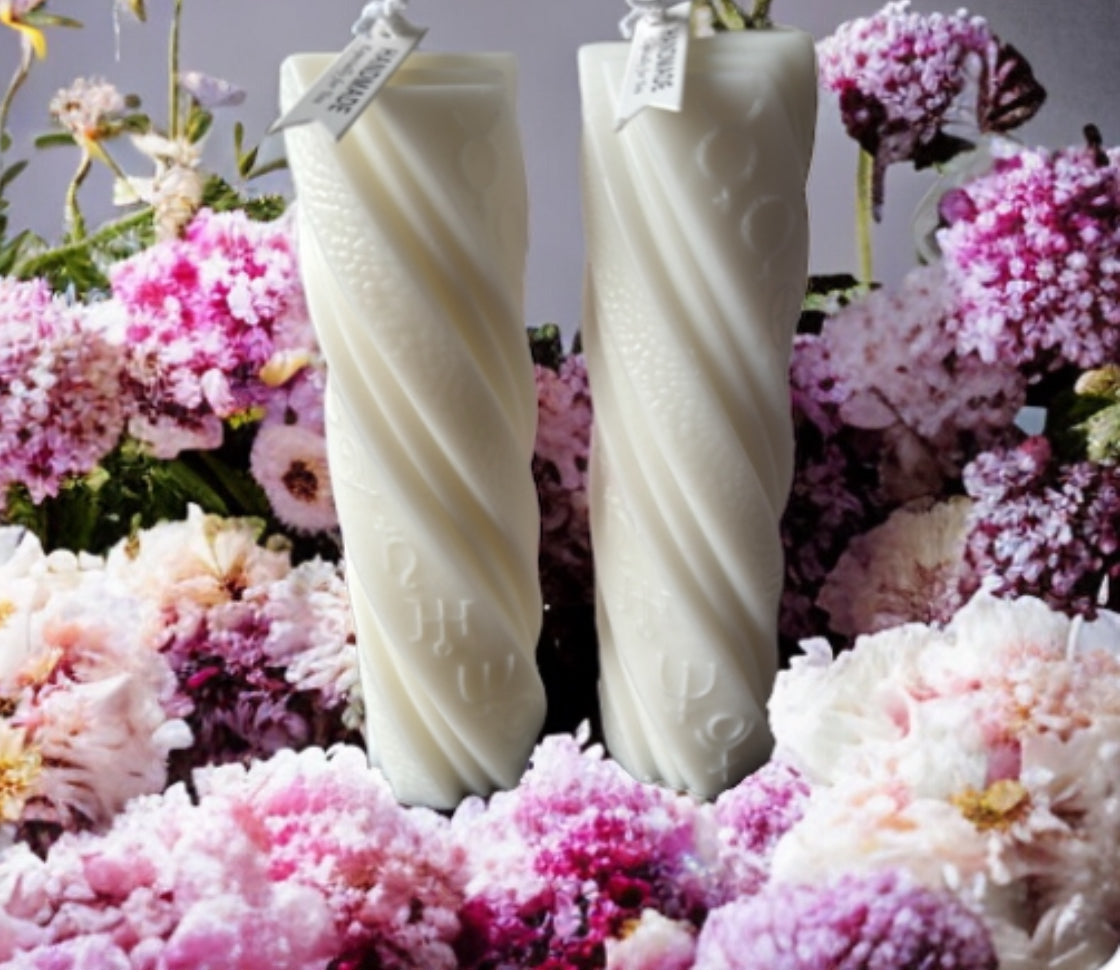 Set Of Two Sculpted Centre Piece Pillar Candles Scented